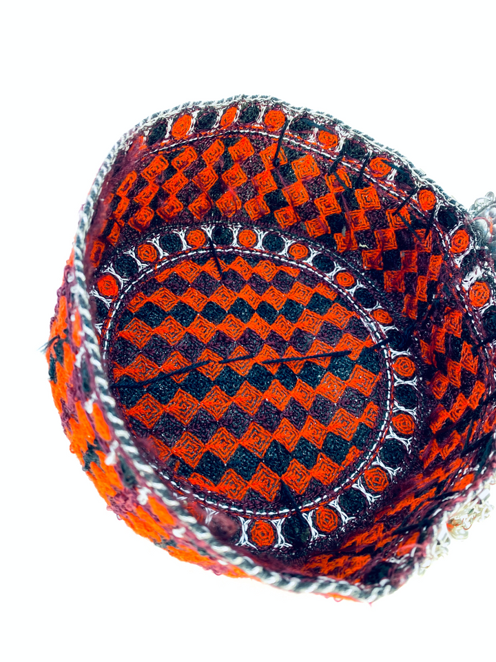 Bright and colorful Afghan hat with traditional embroidery perfect for cultural wear