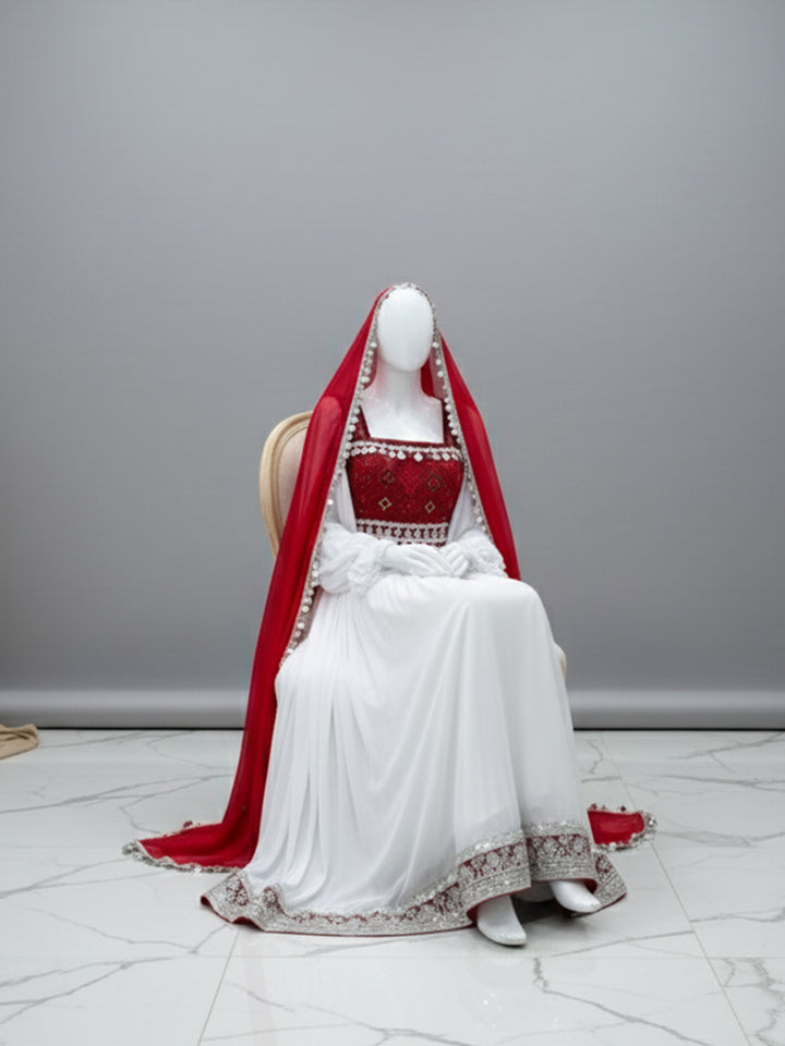Stunning Afghan Kuchi Dress in Red & White Embroidery. Find the best Afghan dress brand in London, near me in Edgware and London.