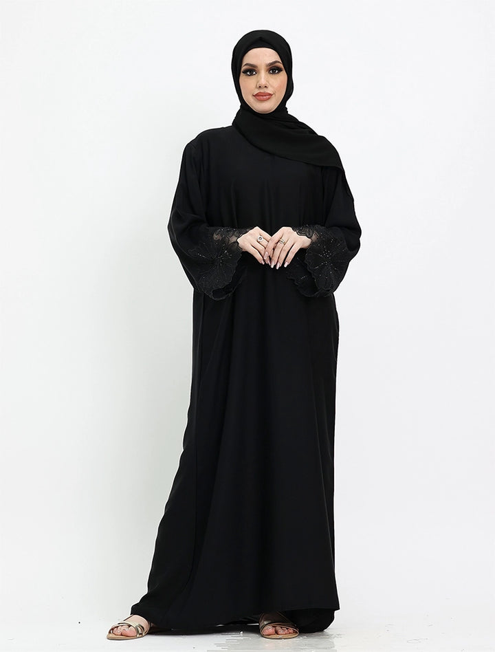 Elegant black abaya dress for women from the Heyam Abaya collection – a modest and stylish abaya perfect for everyday wear