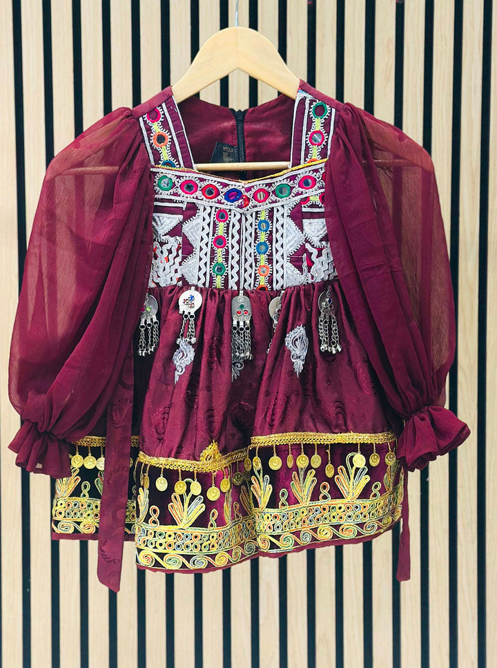 Afghani traditional dress for girls in vibrant red with intricate hand-embroidered details, available at Vavaa UK outlet and online store, perfect for cultural events, Eid, weddings, and special occasions – shop ethnic Afghan clothing near me in UK