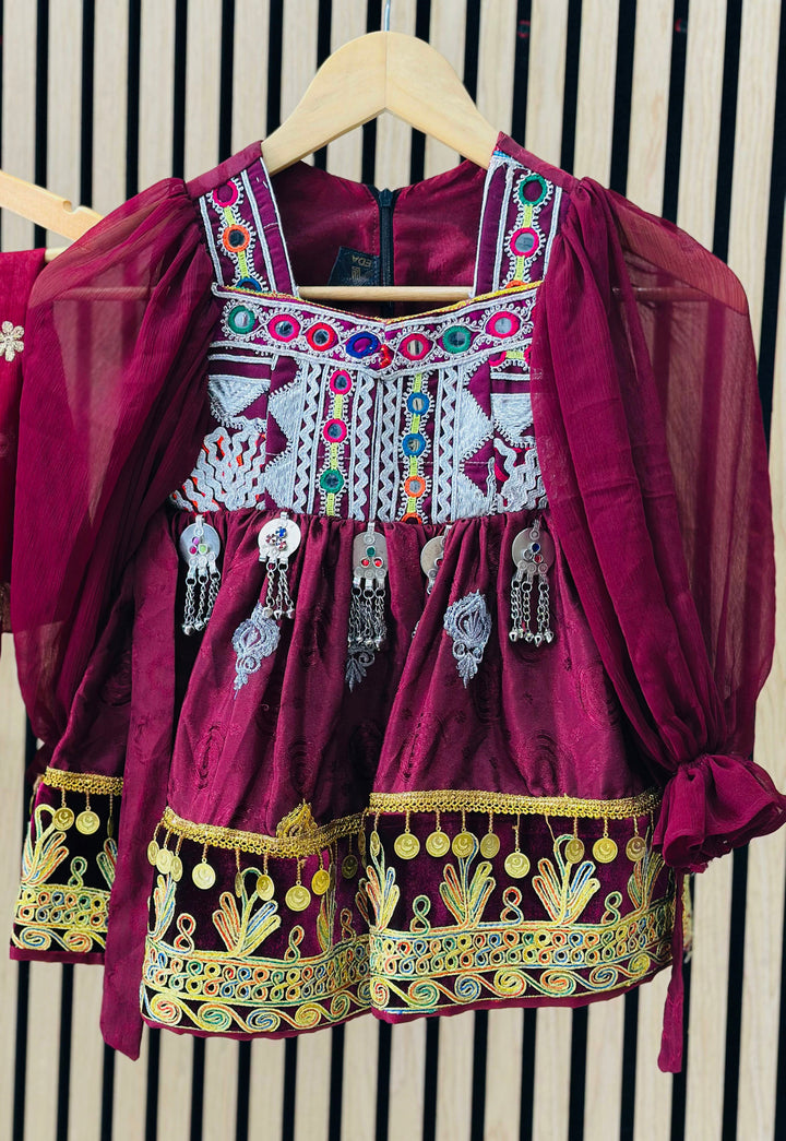 Afghani traditional dress for girls in vibrant red with intricate hand-embroidered details, available at Vavaa UK outlet and online store, perfect for cultural events, Eid, weddings, and special occasions – shop ethnic Afghan clothing near me in UK