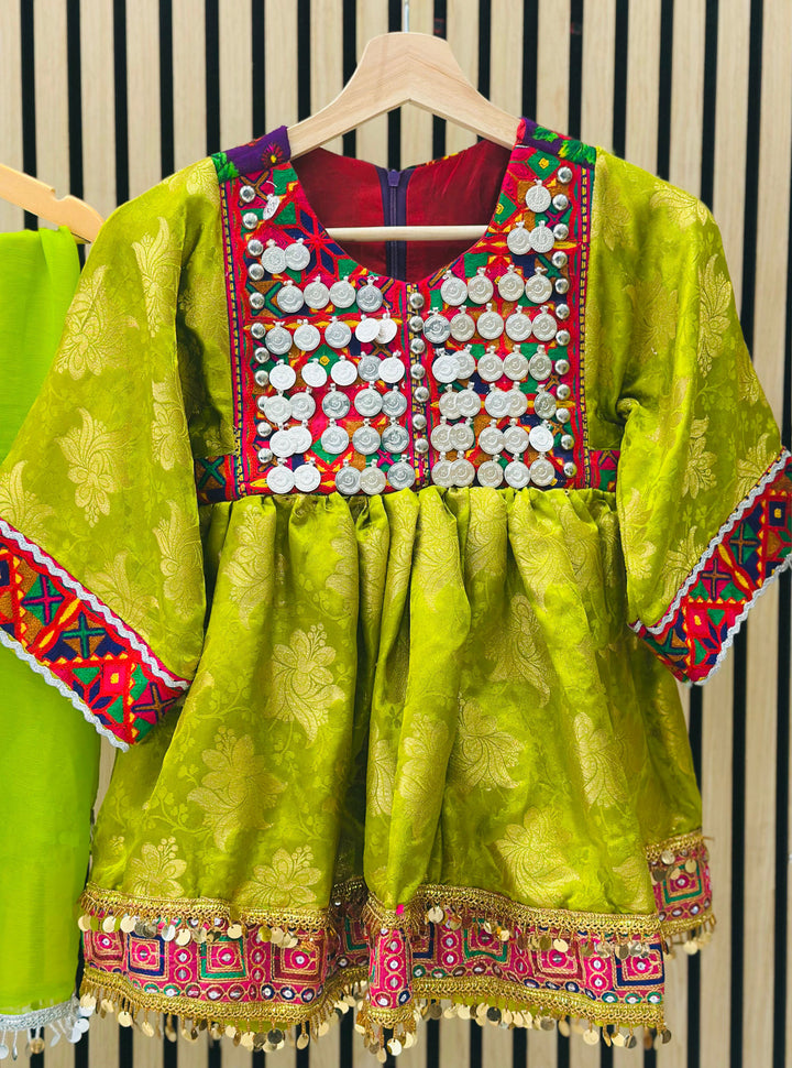 Afghani handmade green dress with mirror accents, coins, and vibrant embroidery

