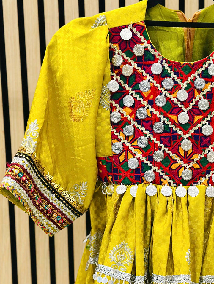 Afghan girls’ cultural dress – yellow Kuchi style with beadwork and mirror work