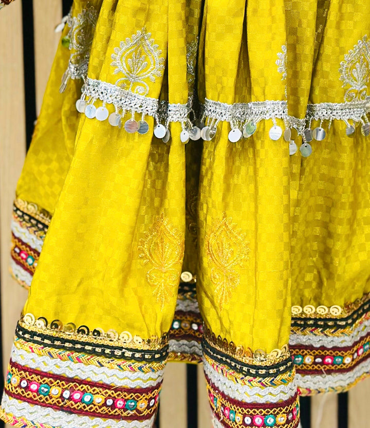 Afghan Kuchi dress for girls – yellow cultural attire with embroidery and mirror details

