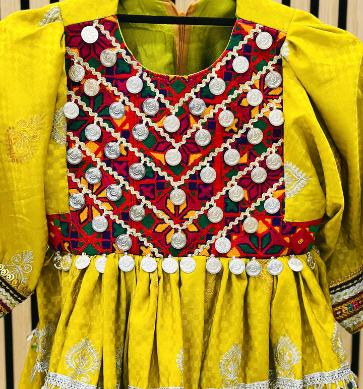 Afghan girls’ festival outfit – bright yellow traditional clothing