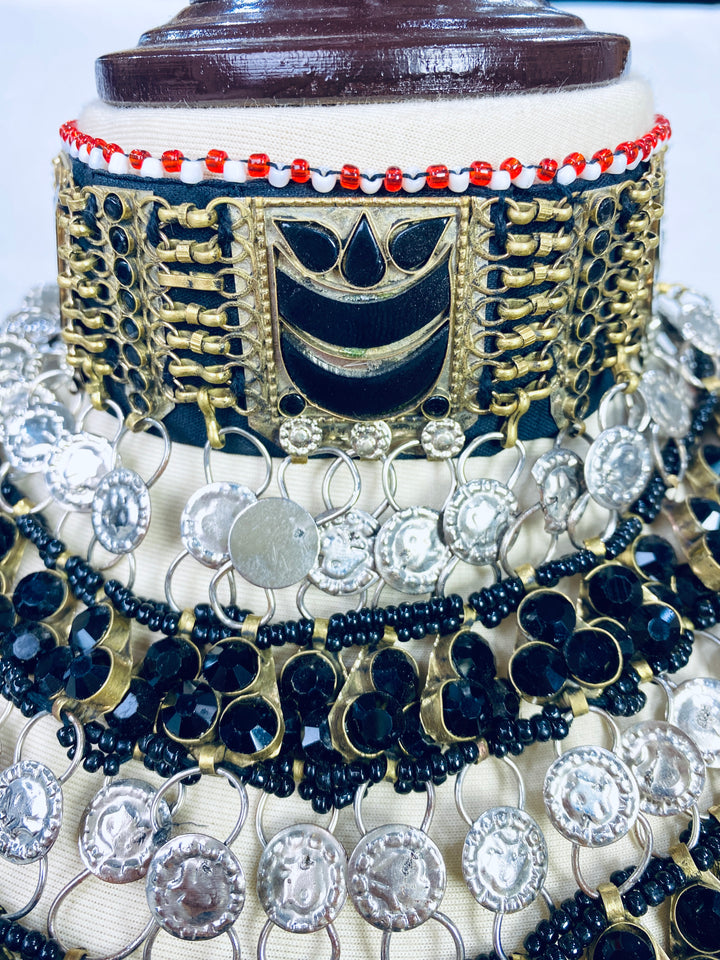 Decorative item with intricate patterns and colors on a white background