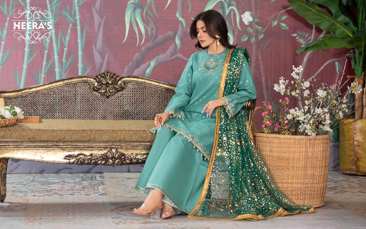 3-piece stitched suit in green with foil printed dupatta  find it discounted near me at Vavaa outlet.