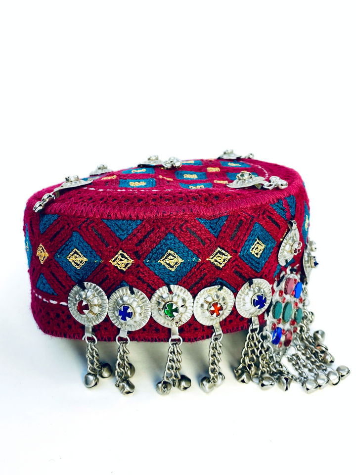 Handmade Afghan Kuchi Cap featuring antique embellishments and vibrant stones  Vavaa London