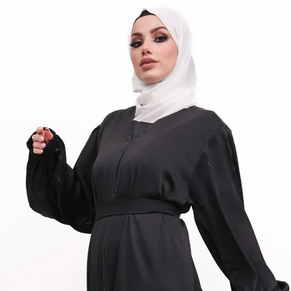 Elegant black satin abaya for women in the UK, featuring diamante details and a flowing modest dress design