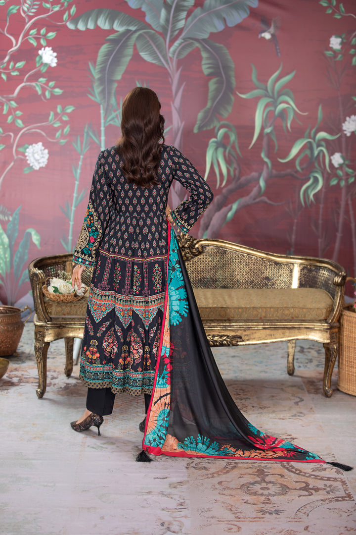 Traditional blue and green embroidered Kameez Shalwar with red accents available near me at Vavaa outlet in UK.