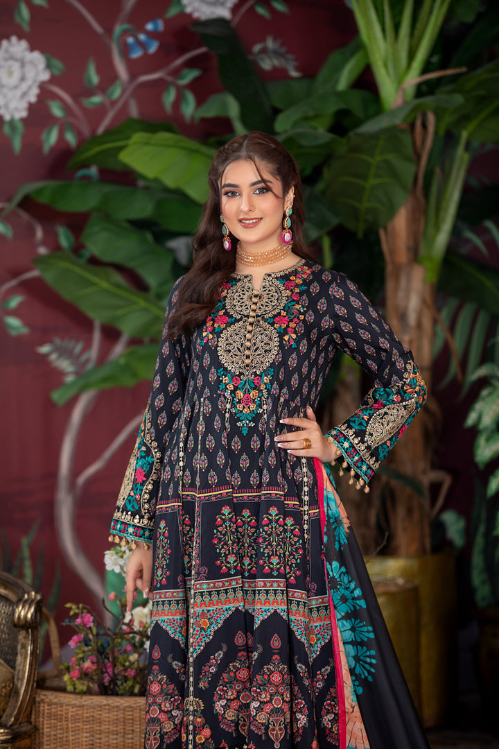 Pakistani Kameez Shalwar in vibrant blue, green, and red intricate embroidery design near me.