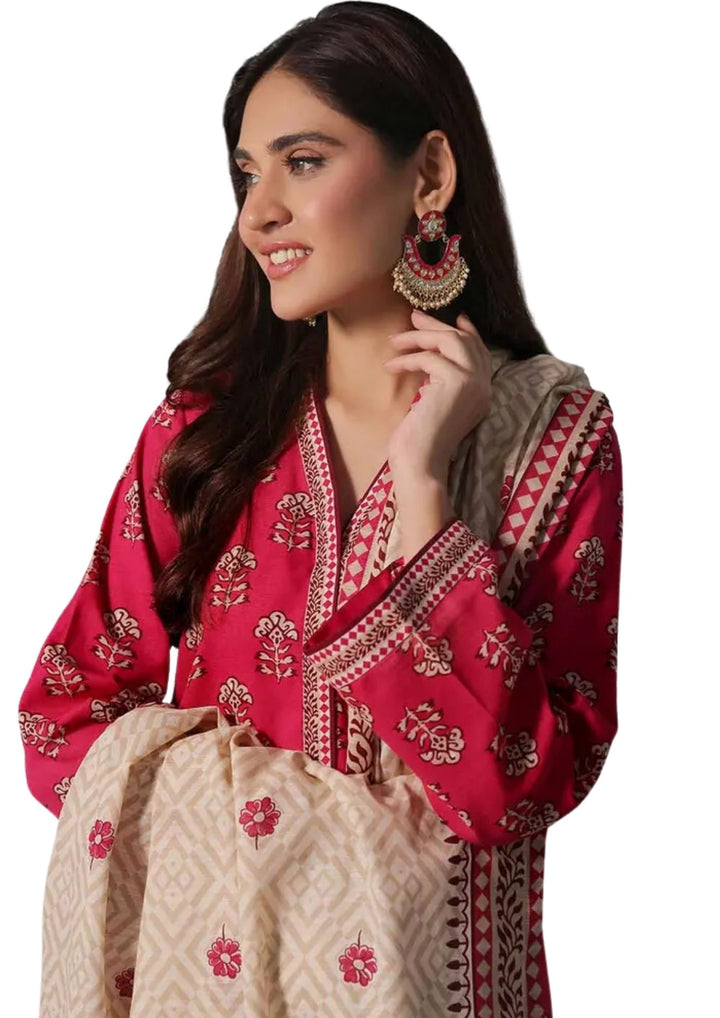 Printed khaddar dress in soft red and beige tones warm winter outfit near me.