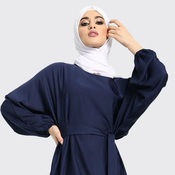 Essential Modest Abaya Dress for women, offering a classic minimalist design and lightweight fabric for comfortable, all-day wear. Ideal for everyday modest fashion in the UK.