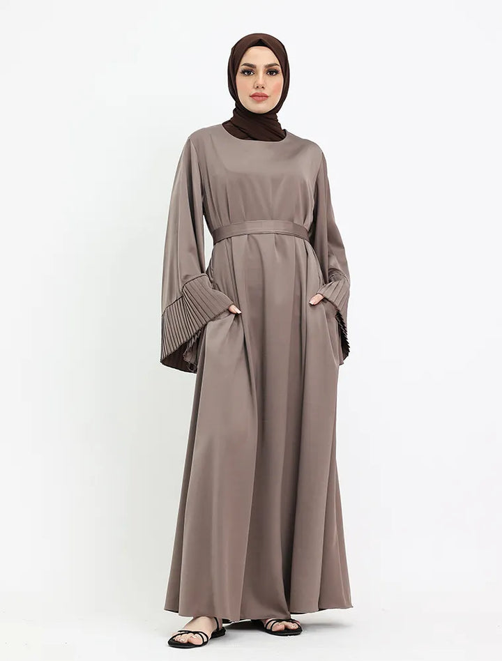 Satin abaya near me with pleat cuff sleeves, Muslim women’s dress near me for mosque and celebrations Vavaa UK Outlet.