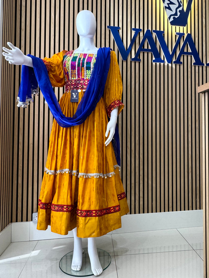 Shop Afghan Kuchi dress with orange & blue embroidery near me. Discounted prices, sale offers, and fast shipping available at Vavaa.