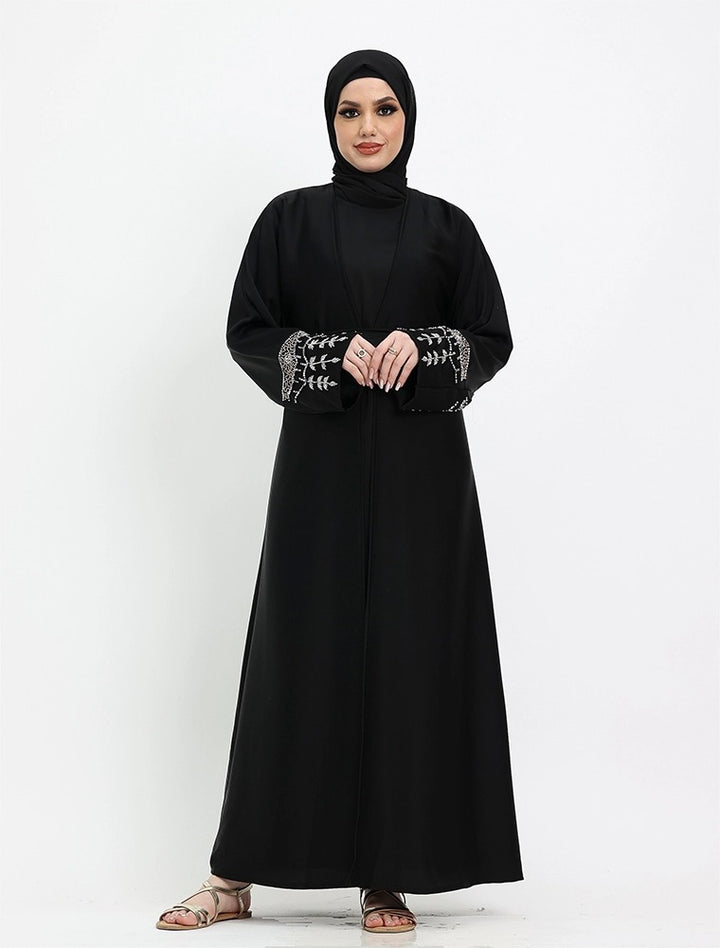 Elegant black Tuan abaya near me  with inner slip and hijab  now at Vavaa outlet UK, Deansbrook Road.
