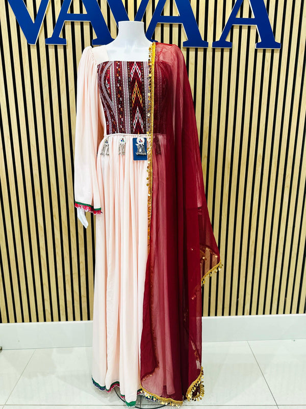 Chic dress with a patterned top and sheer sleeves, showcased on a mannequin against a branded backdrop. Find your perfect fit with Vavaa's limited-time offer in London and enjoy discounted prices