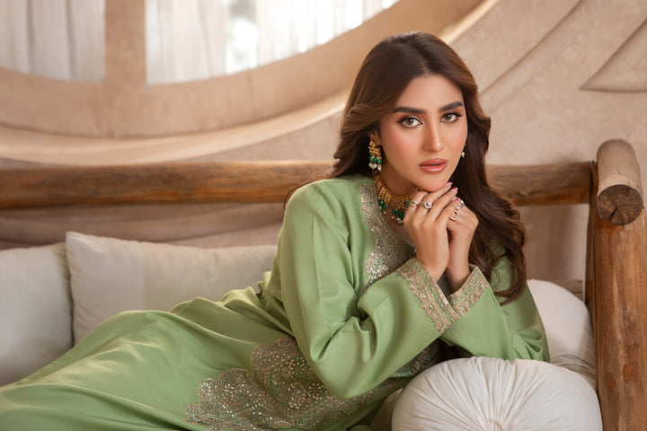 green dress with embroidery on sleeves and chest now at Vavaa UK outlet.