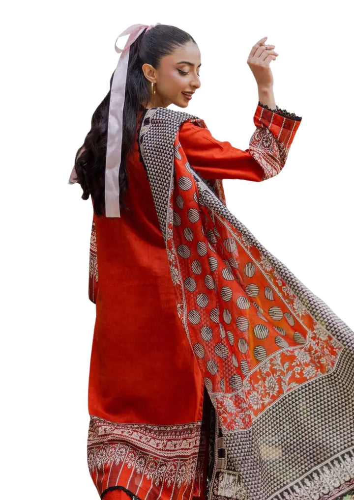 Orange 3-piece khaddar dress near me with floral and ethnic prints shop near me in UK.